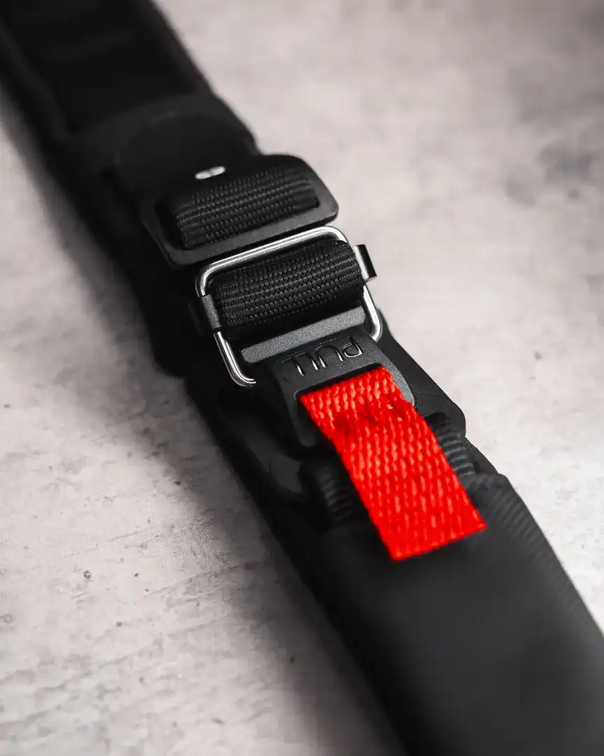 Close-up of a Fidlock magnetic-assisted mechanical chin strap buckle