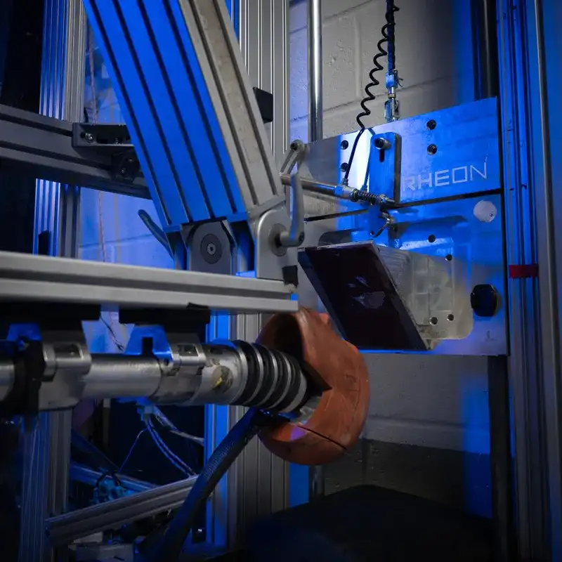 Test rig with instrumented headform ready for impact testing